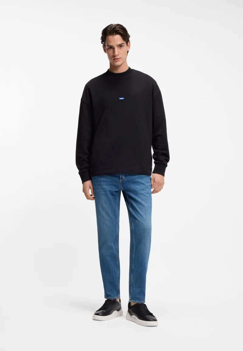 HUGO Dark Blue Tapered-fit jeans in mid-blue stretch denim for Men | Best Price UAE