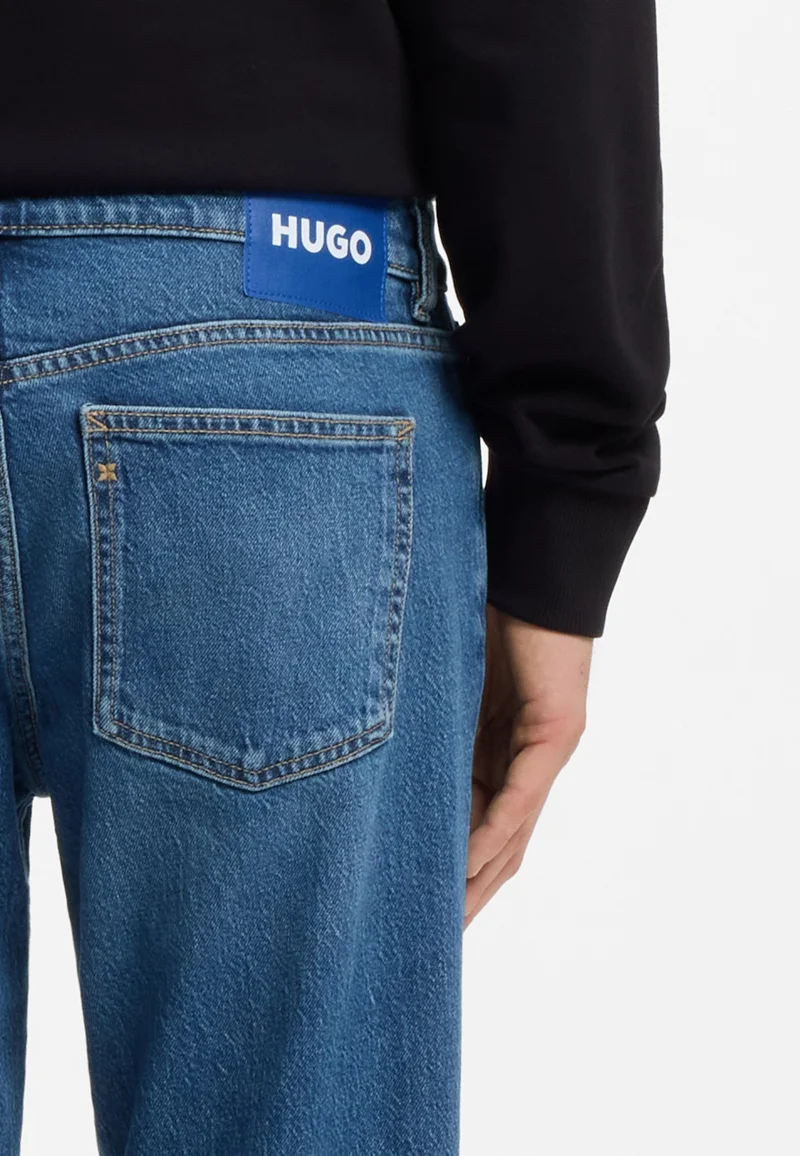 HUGO Dark Blue Tapered-fit jeans in mid-blue stretch denim for Men | Best Price UAE