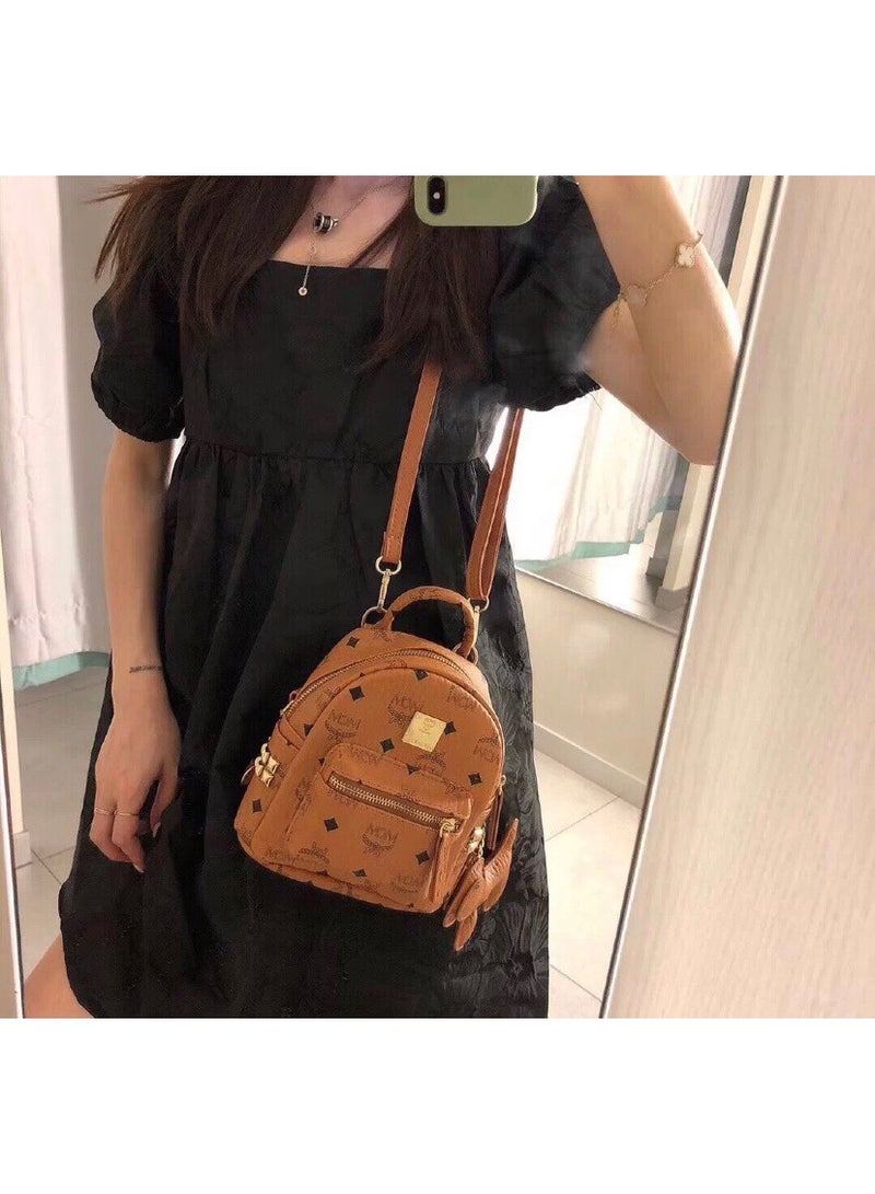 MCM Brown Monogrammed Mini Backpack with Detachable Strap and Visetos Pattern