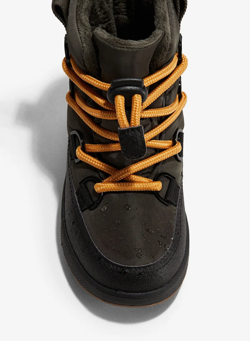 اتش اند ام بوت للثلج بتبطين ناعم مقاوم للماء