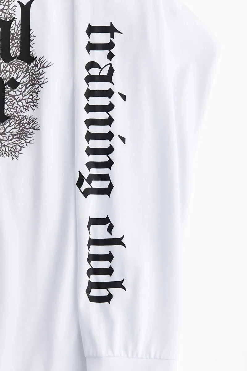 اتش اند ام بلوزة رياضية بأكمام طويلة من نسيج دراي موف