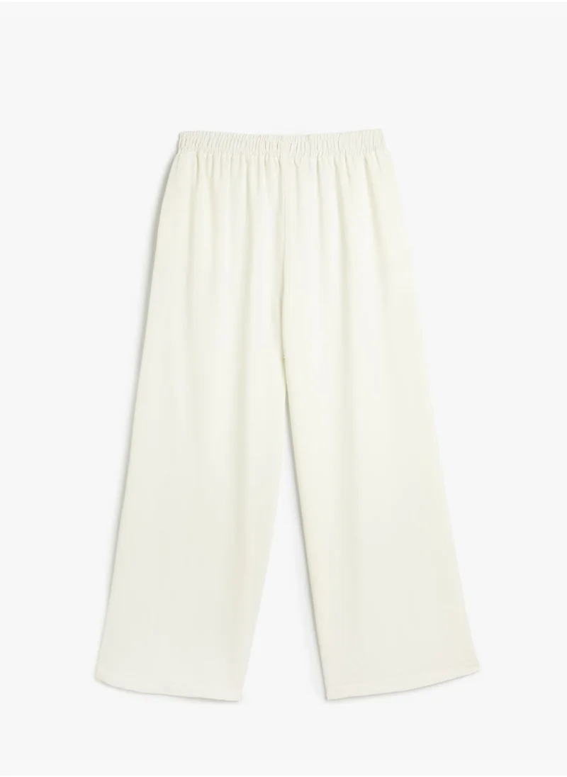 KOTON Line Detail Elastic Waist Palazzo Trousers