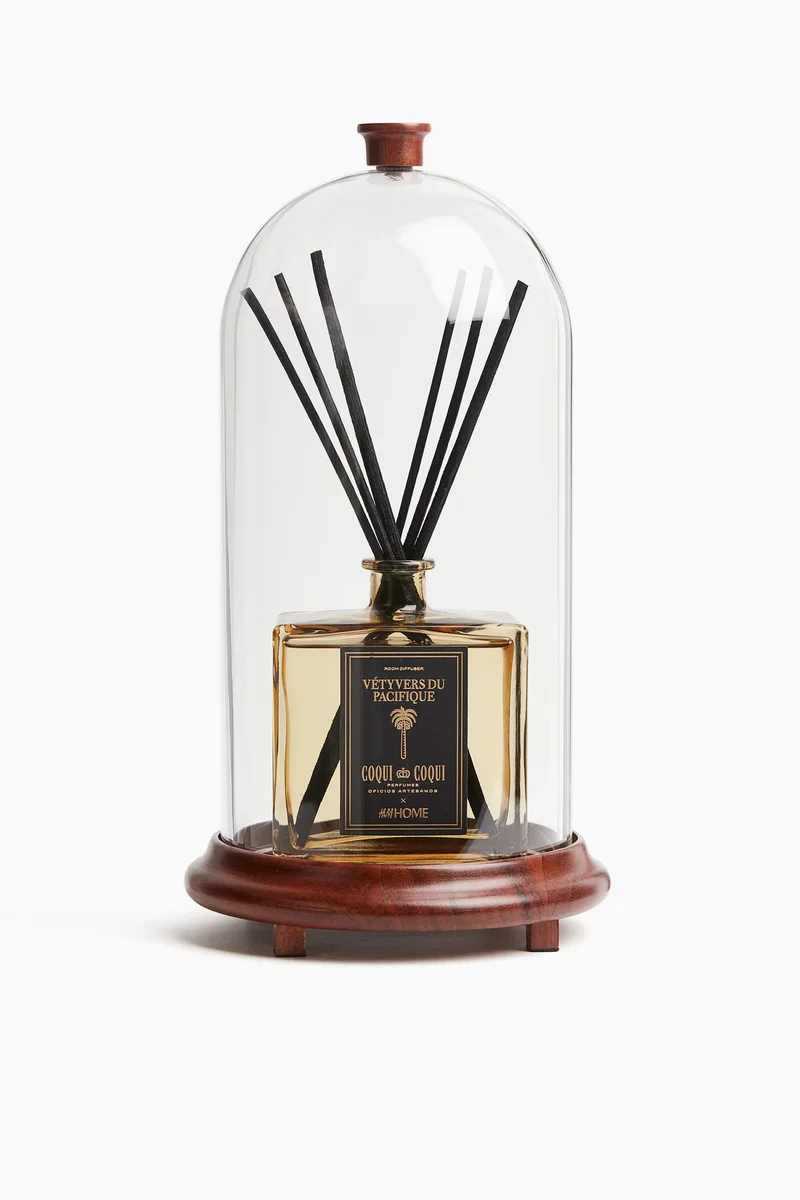 H&M Glass dome with a wooden base