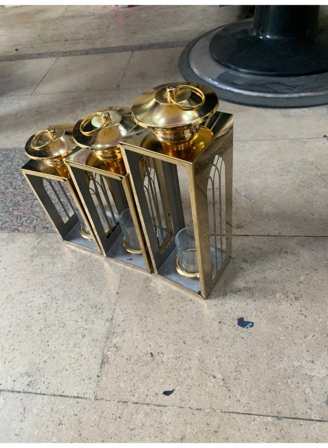 "An elegant set of golden lanterns in three different sizes – a perfect decorative addition to your home during Ramadan and special occasions. Luxurious design without a candle for a uniqu  - Image 2