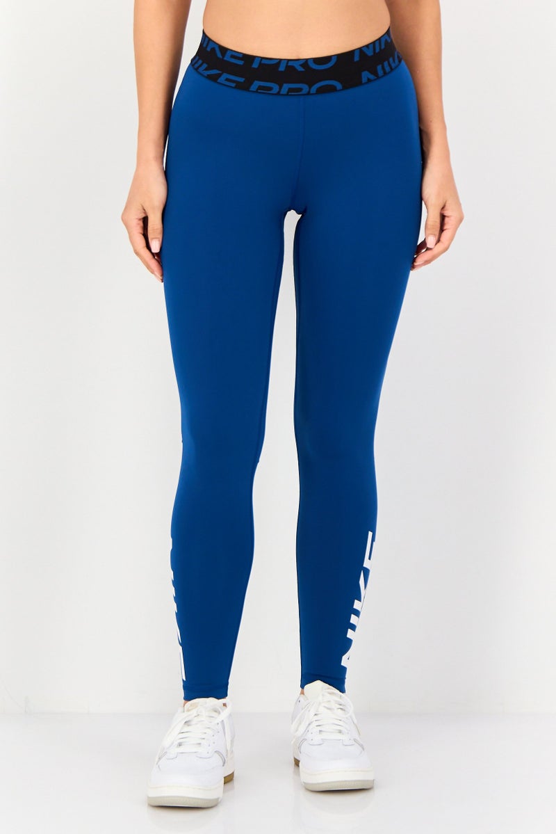 Nike سراويل ليغينغز رياضية نسائية مناسبة للتدريب، أزرق داكن - Image 1