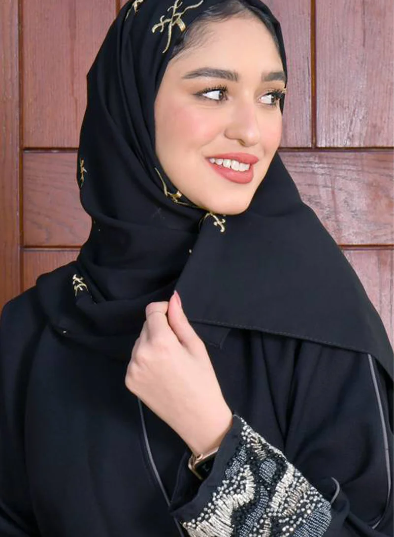 HAWRAA ABAYA Black veil with the golden palm and sword logo