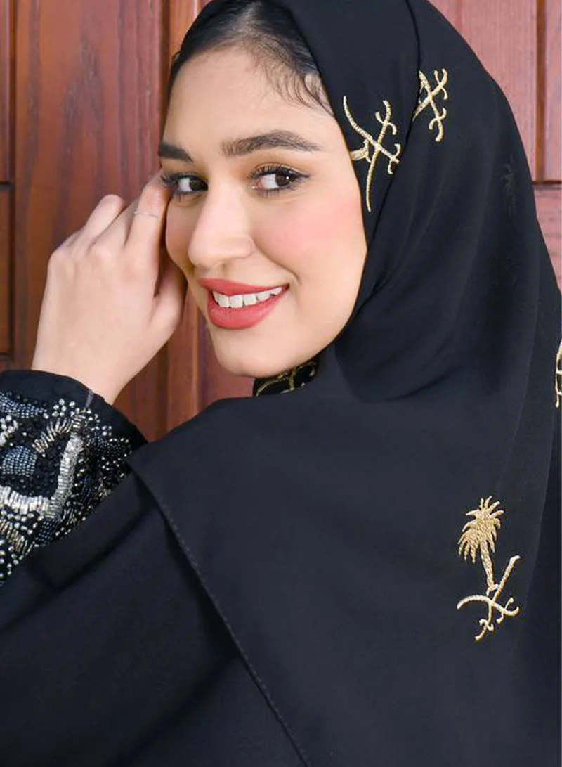 HAWRAA ABAYA Black veil with the golden palm and sword logo