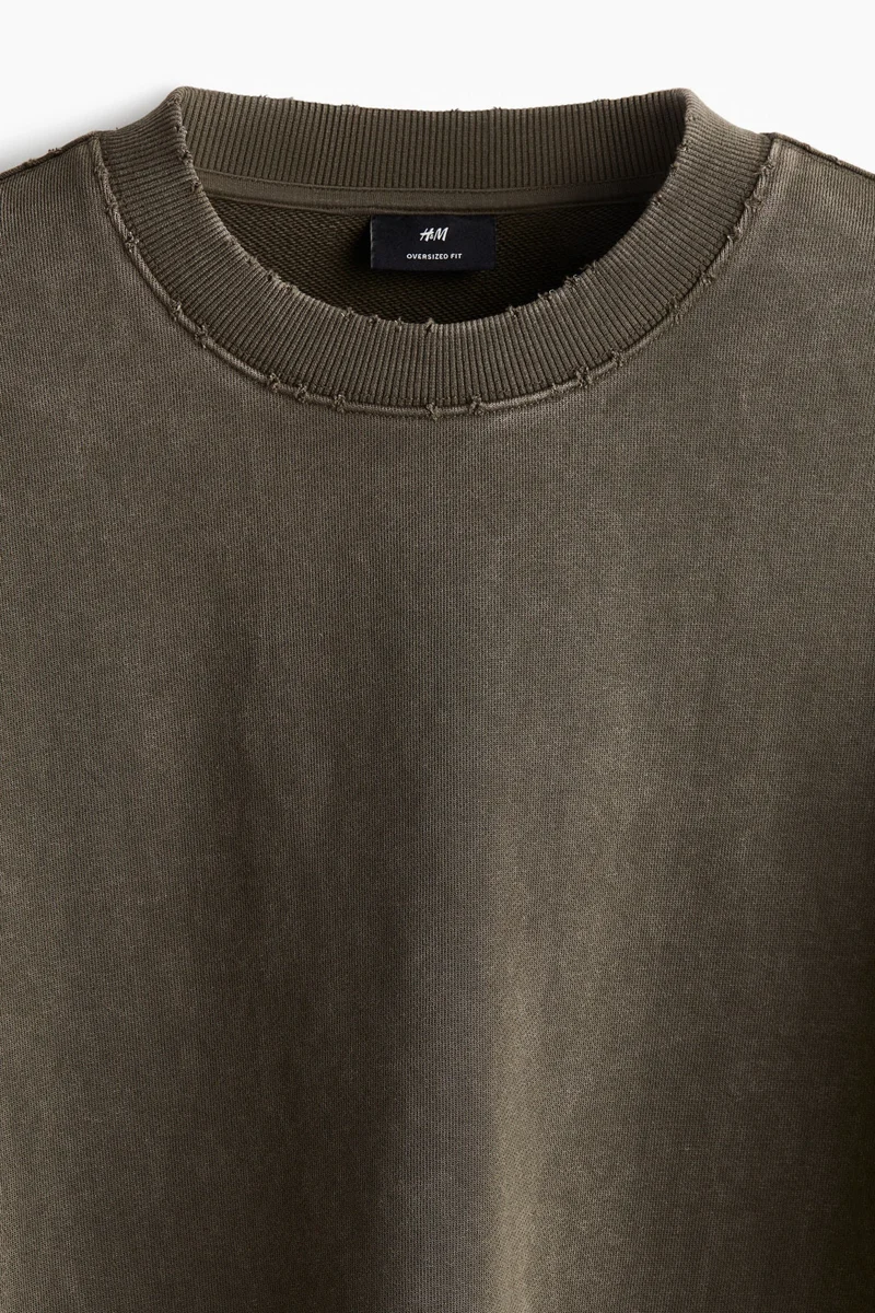 H&M Oversized Fit washed-look sweatshirt