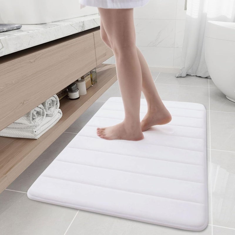 Buganda Memory Foam Bath Mat, 35.4" x 24", Ultra Soft and Non-Slip Bathroom Rugs, Water Absorbent and Machine Washable Bath Rug Runner for Bathroom, Shower, and Tub, White - Image 1