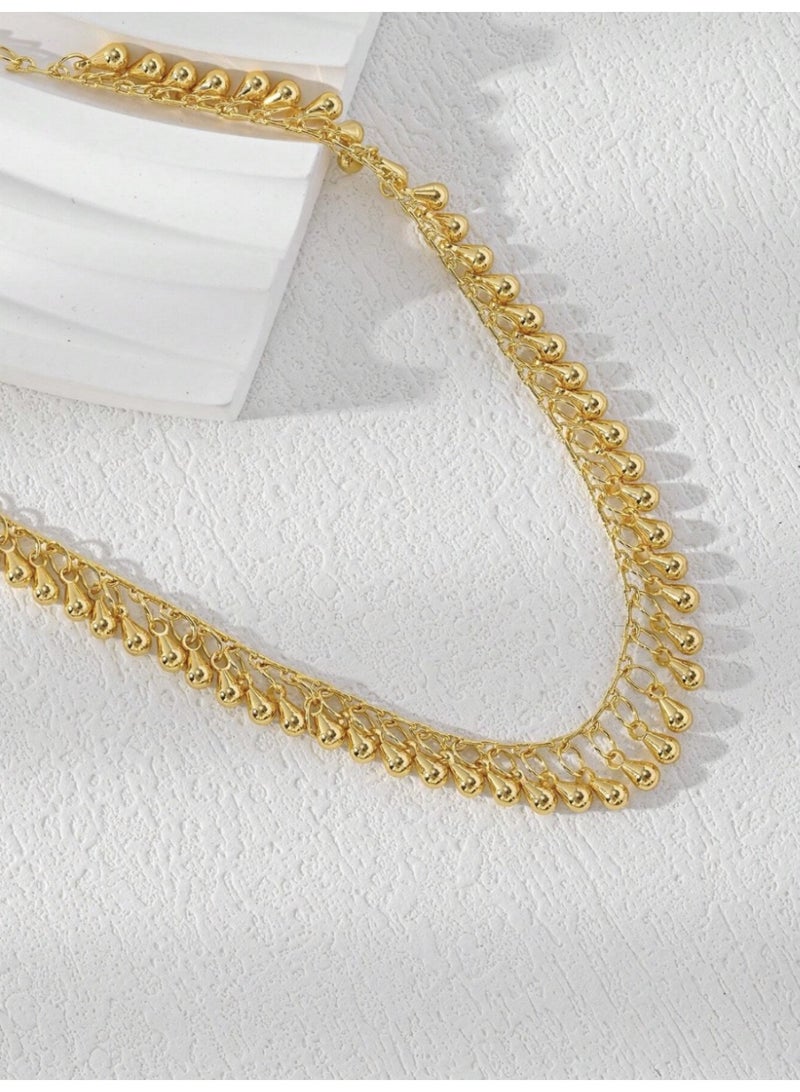 ڤيا خلخال أنيق مطلي بذهب عيار 18K بتفاصيل ناعمة على شكل قطرة ماء، مثالي للاستخدام اليومي بتصميم بسيط وراقي. - Image 2