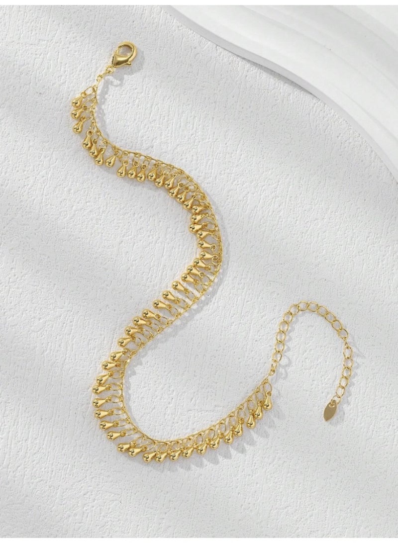 ڤيا خلخال أنيق مطلي بذهب عيار 18K بتفاصيل ناعمة على شكل قطرة ماء، مثالي للاستخدام اليومي بتصميم بسيط وراقي. - Image 4