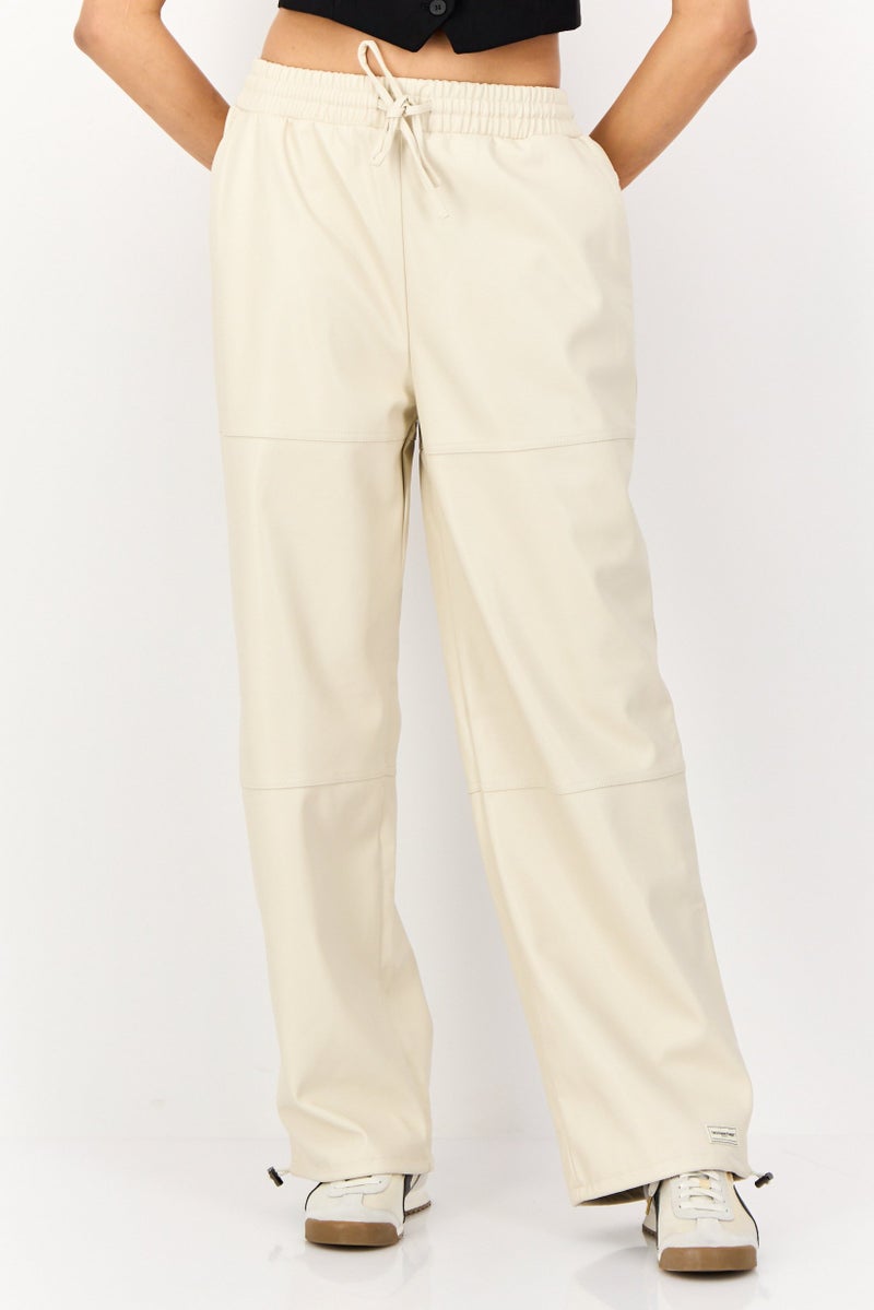 The Giving Movement Women Regular Fit Plain Leather Jogger Pants, Cream - Image 1
