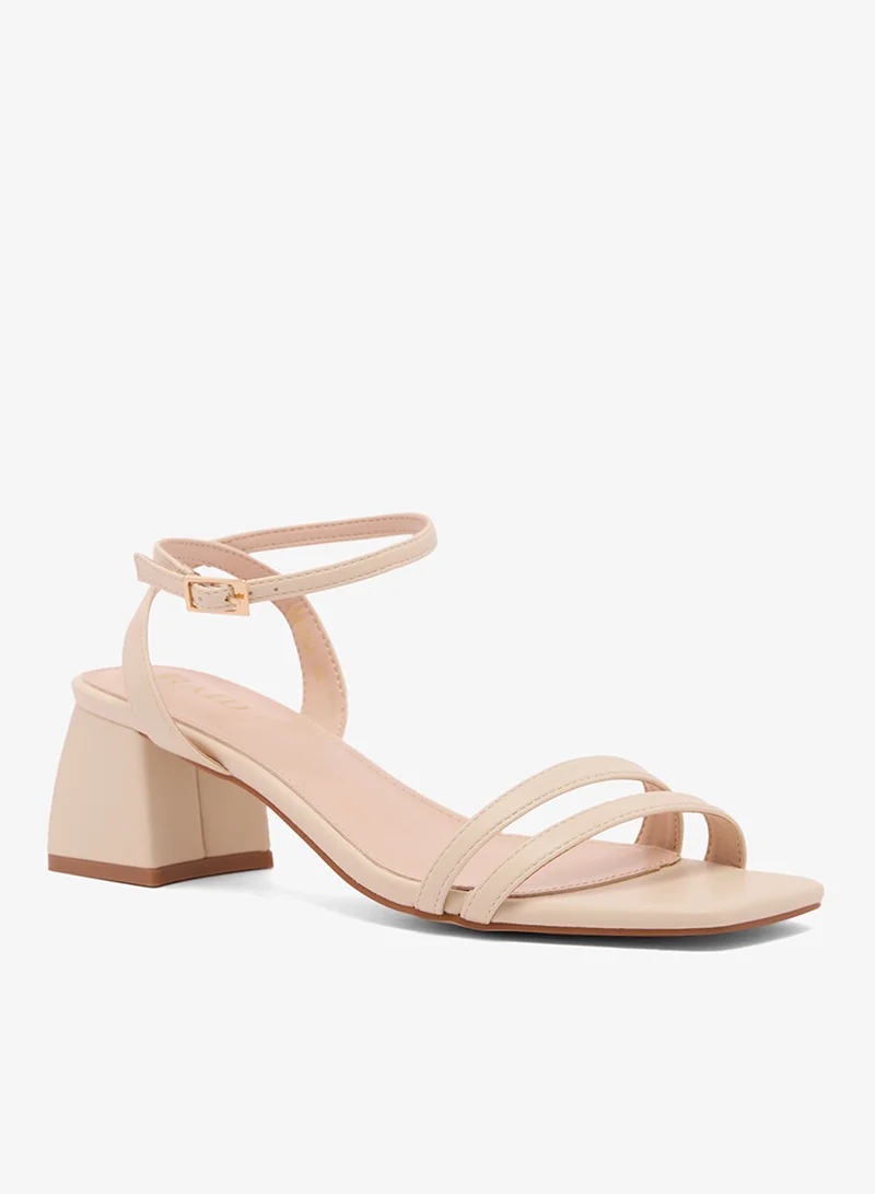 ريد صنادل بكعب وحزام للكاحل