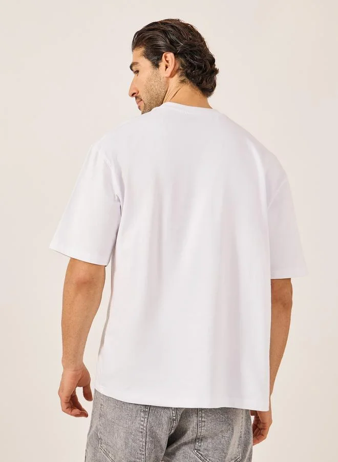 Styli Graphic Print Oversized Round Neck T-Shirt