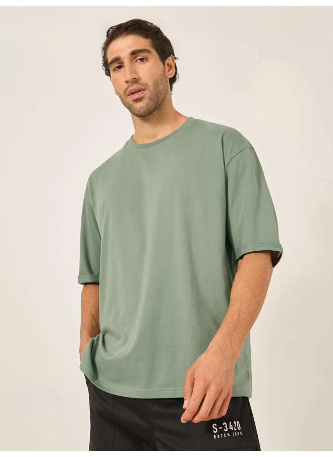 ستايلي Styli Oversized Roll Up Sleeves T-Shirt with Side Slit