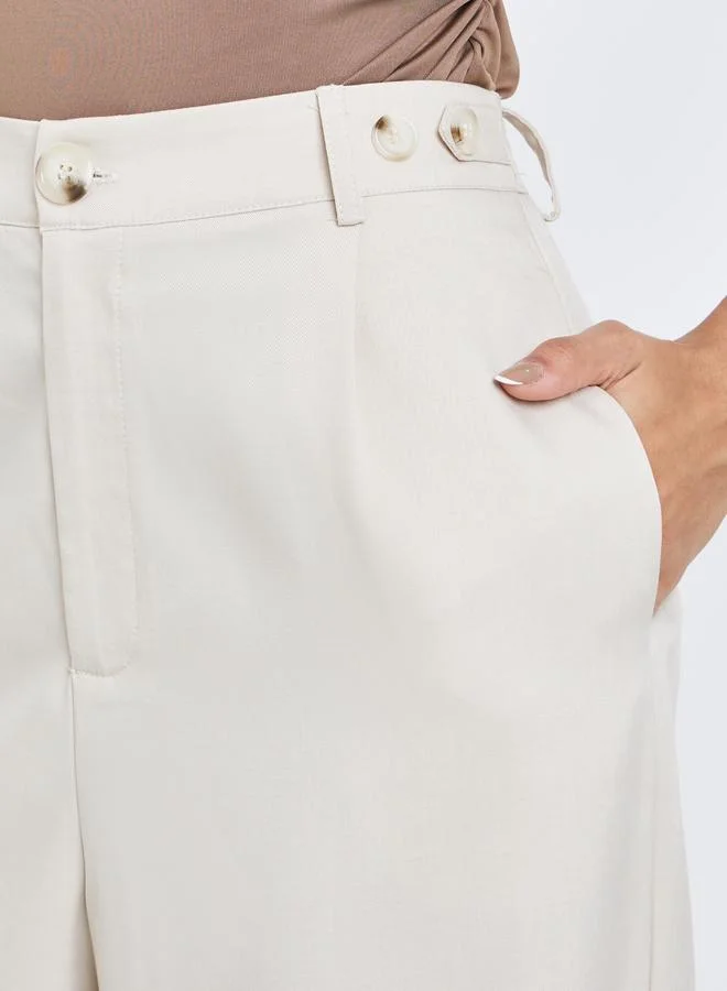 Styli  Styli Cream Tapered Fit Pants with Buttons for Women | Best Price UAE