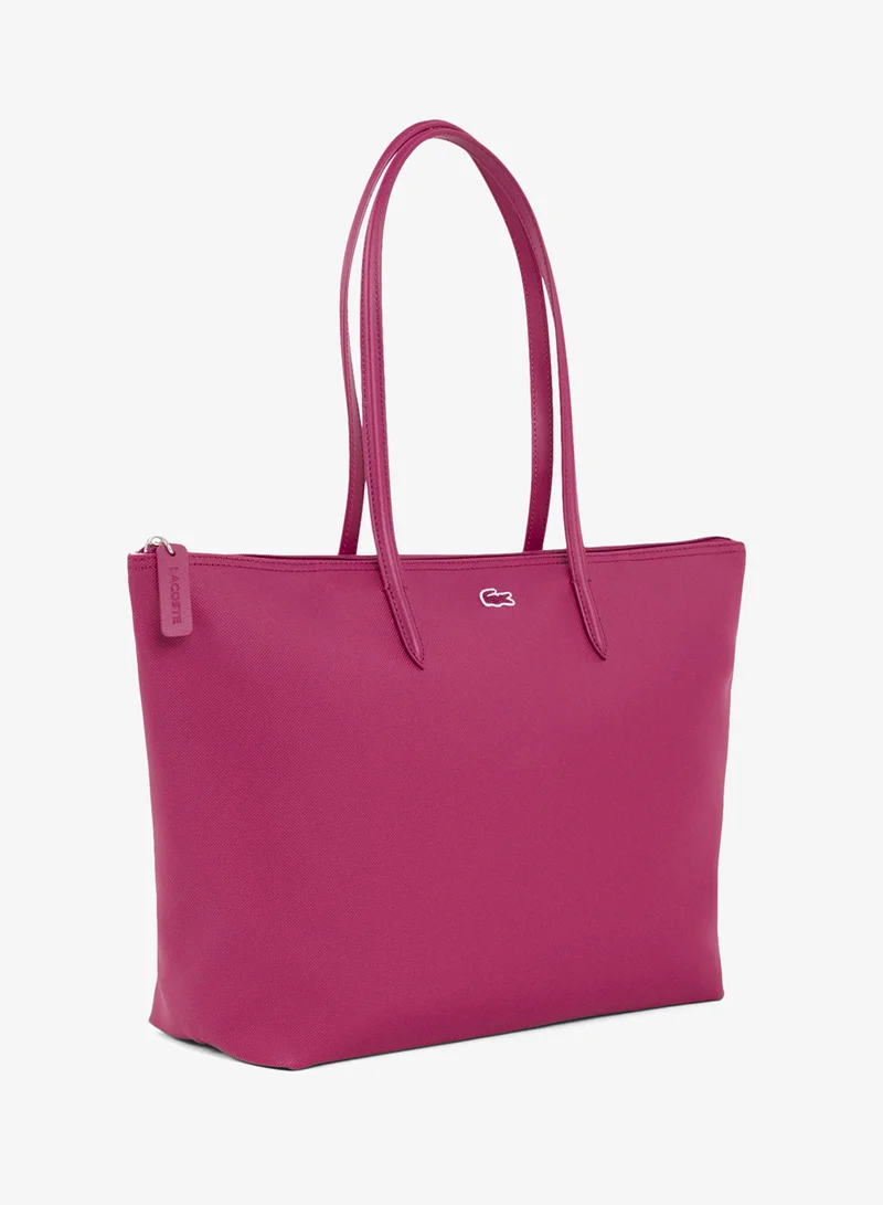 Lacoste  The iconic L1212 style in a large shopping bag for Women | Best Price UAE