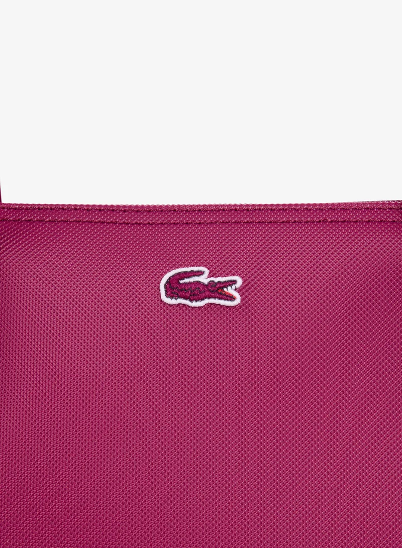 Lacoste  The iconic L1212 style in a large shopping bag for Women | Best Price UAE