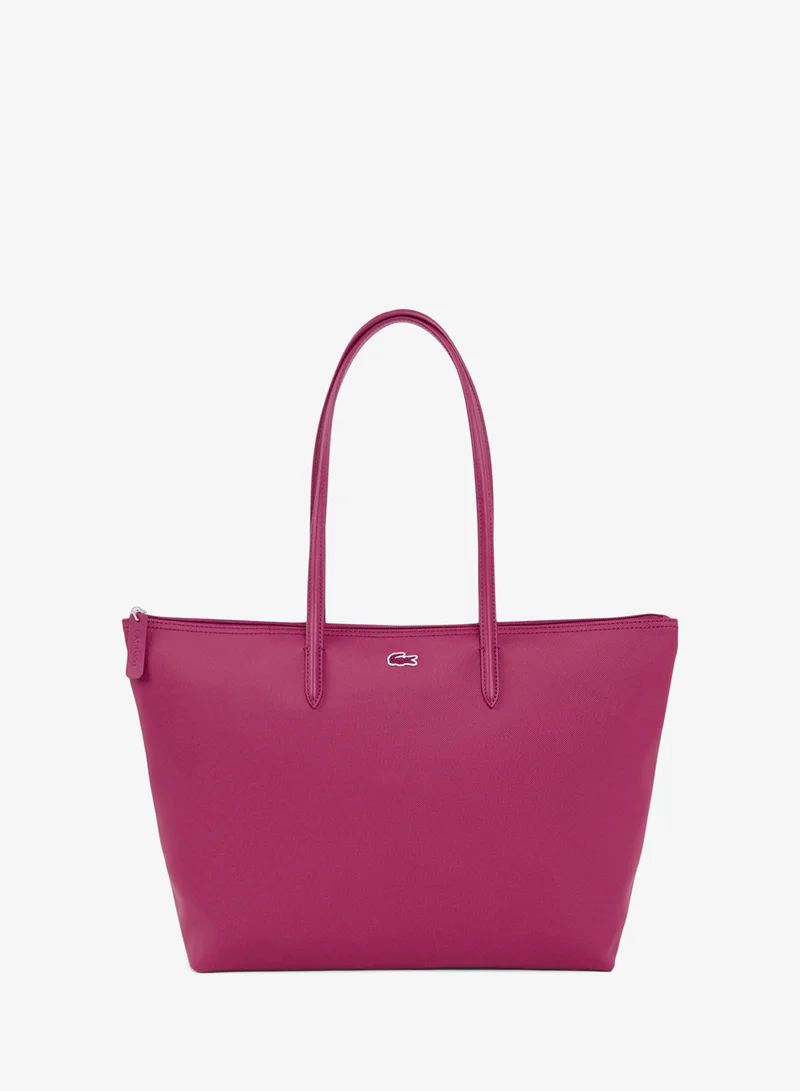 The iconic L1212 style in a large shopping bag