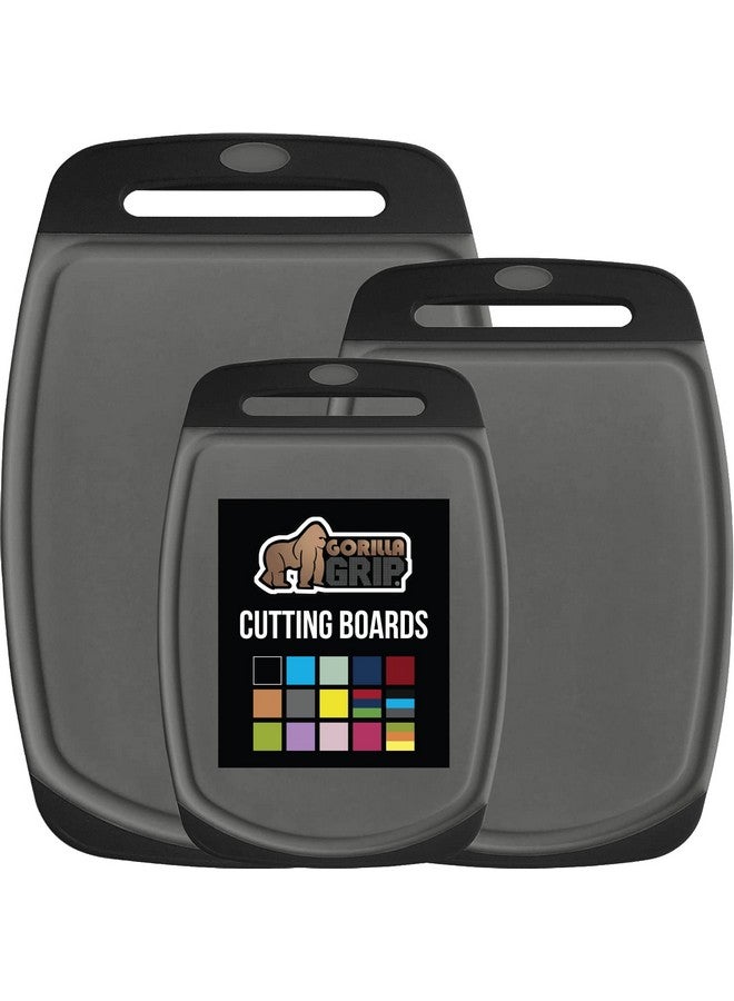 GORILLA GRIP 100% BPA-Free Reversible Kitchen Cutting Board Set of 3, Nonporous, Juice Grooves to Catch Liquid, Slip Resistant Handle Border, Dishwasher Safe, Durable Food Chopping Boards, Black Gray - Image 1
