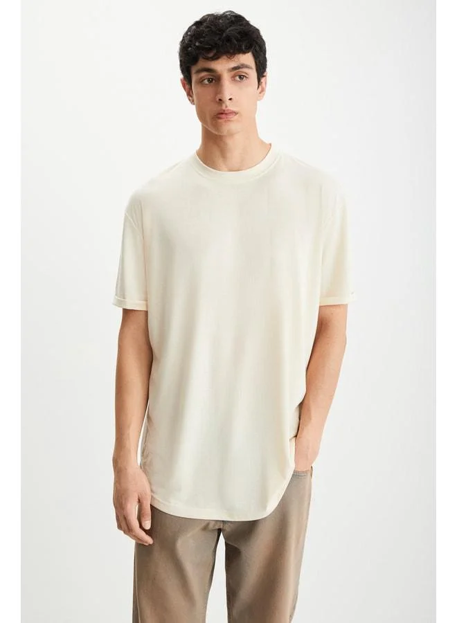 Grimelange Oscar Men's Comfort Fit Long Flowing Fabric Vanilla T‑shirt.
