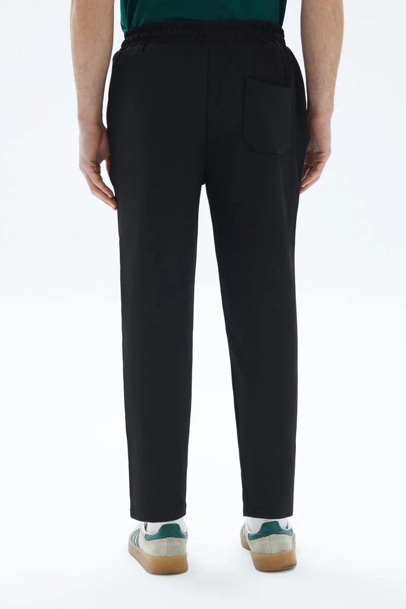 Wecre8 Black Plain Sweatpants By WECRE8