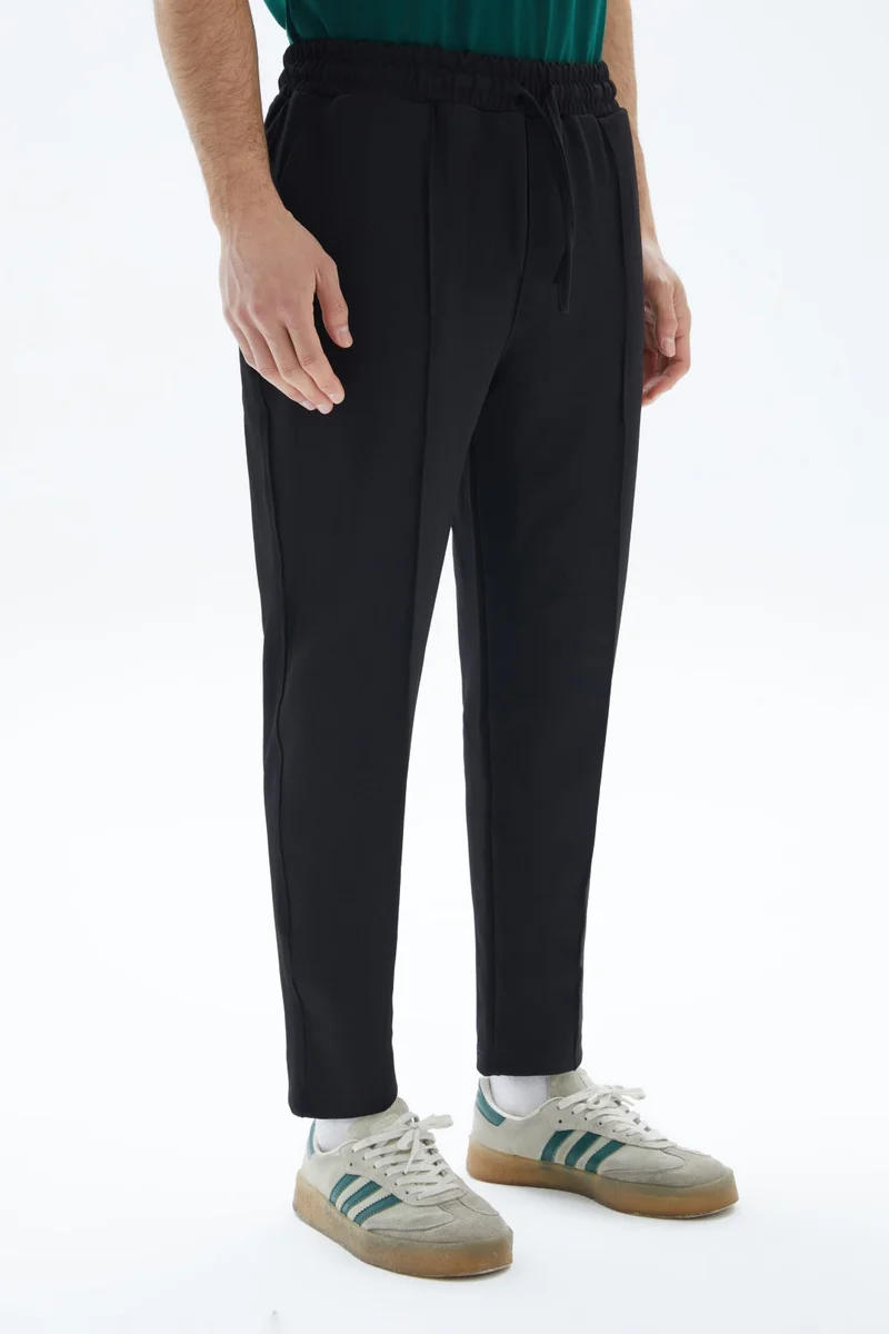 Wecre8 Black Plain Sweatpants By WECRE8