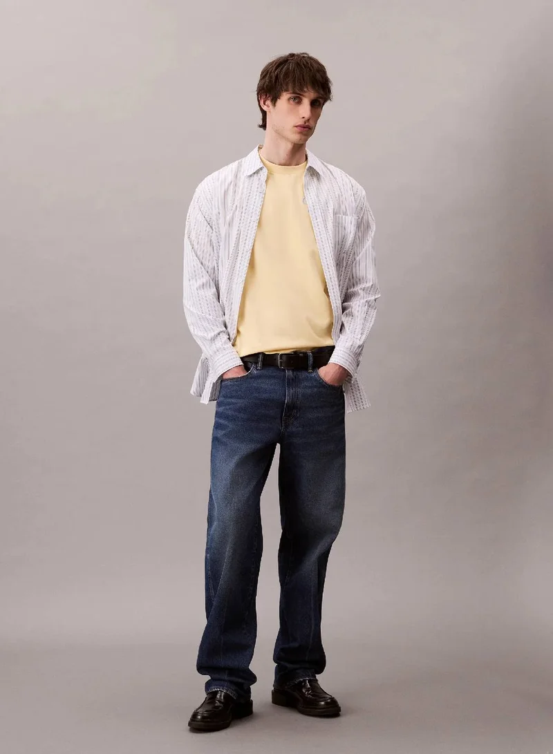 Calvin Klein Jeans Sunlight Script Logo Graphic Relaxed T-Shirt for Men | Best Price UAE