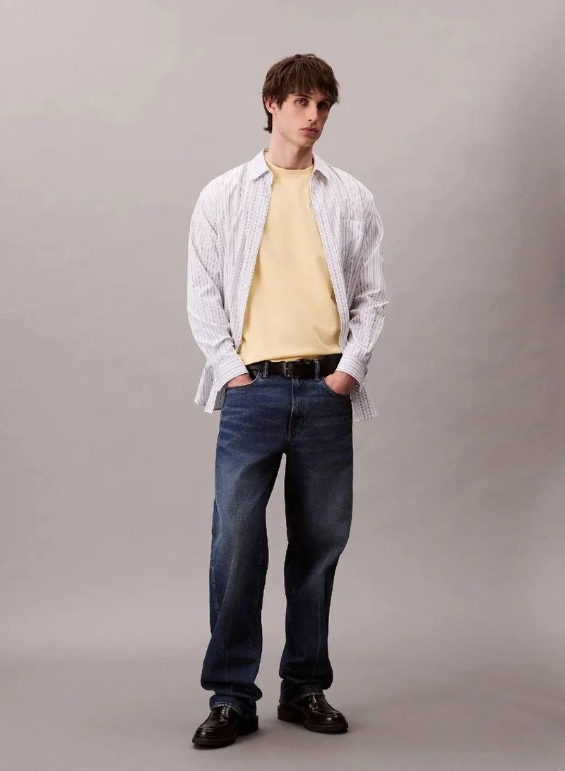 Calvin Klein Jeans Sunlight Script Logo Graphic Relaxed T-Shirt for Men | Best Price UAE