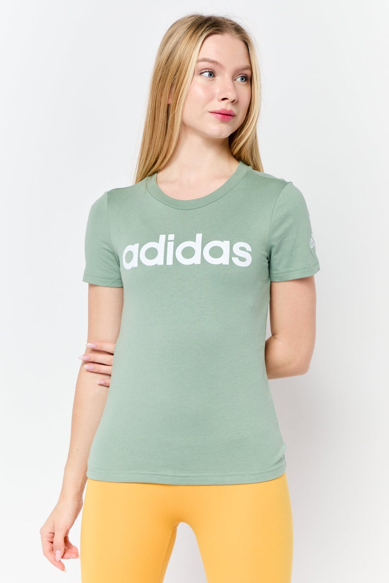 Adidas Women Sportswear Fit Short Sleeve Outdoor Top, Green  - Image 1