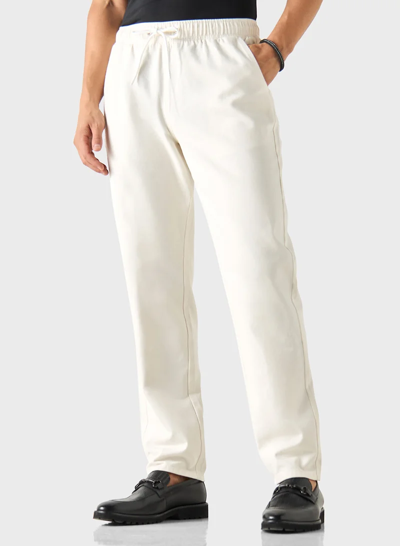 ايكونيك Iconic Solid Joggers with Drawstring Closure and P