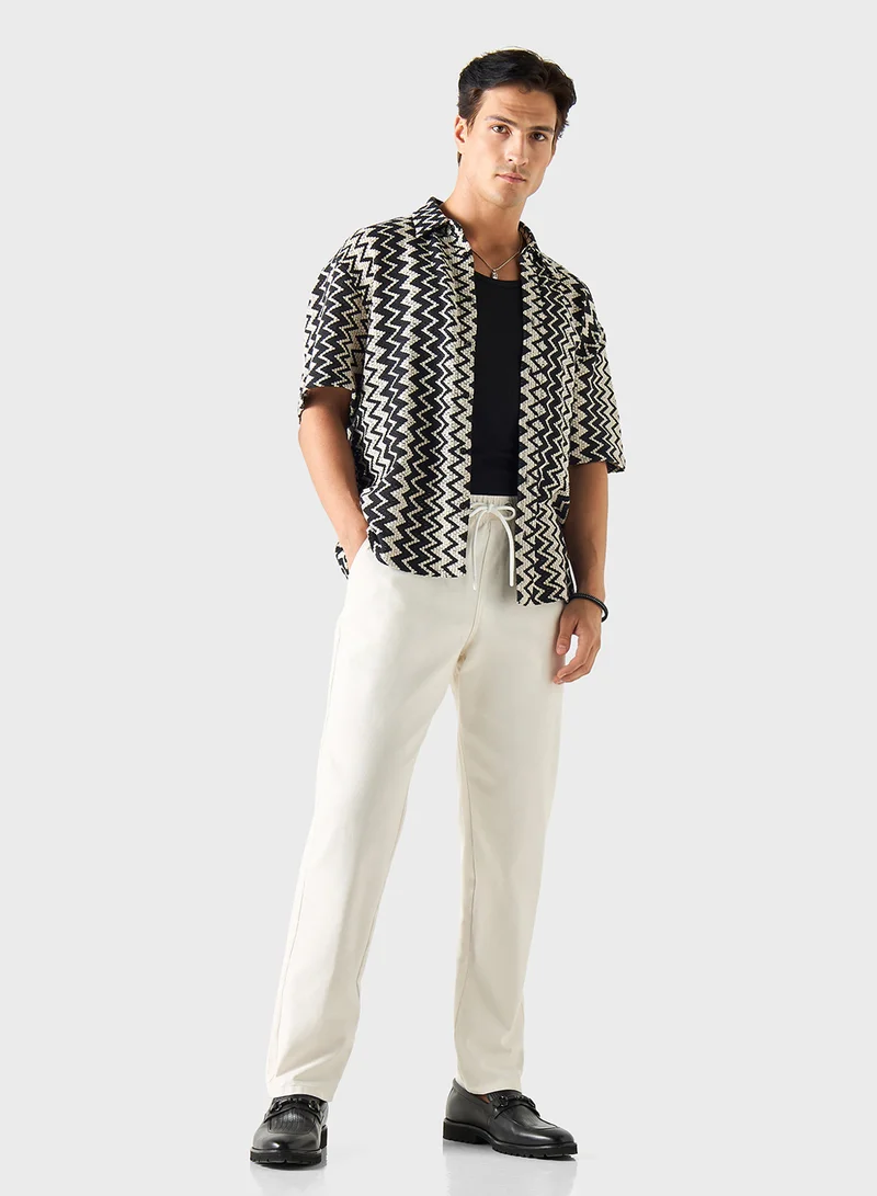ايكونيك Iconic Solid Joggers with Drawstring Closure and P