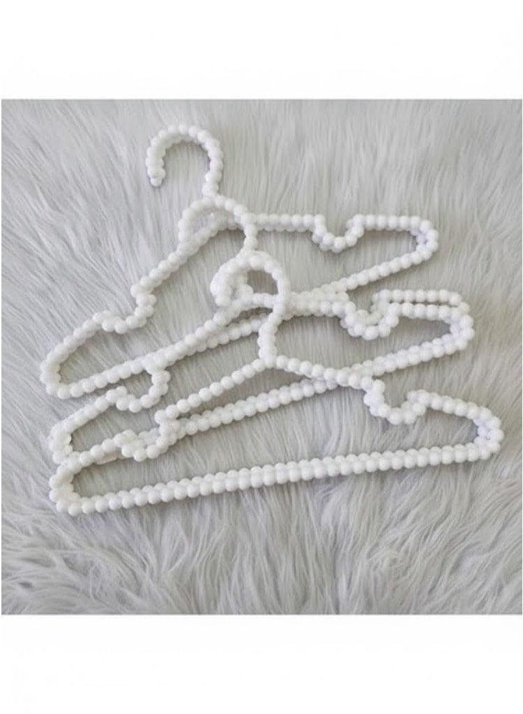 علاقة ملابس بلاستيكية على شكل خرز –لون ابيض -3 قطع - Image 1