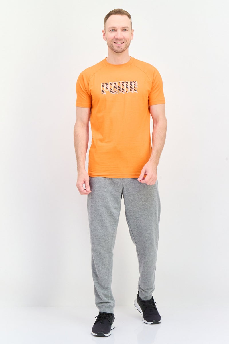 PUMA Men Sportswear Fit Brand Logo Short Sleeves Outdoor T-Shirt, Orange - Image 4