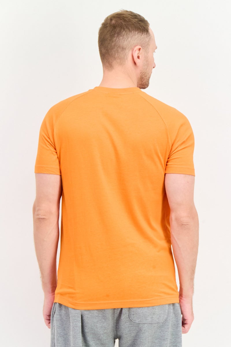 PUMA Men Sportswear Fit Brand Logo Short Sleeves Outdoor T-Shirt, Orange - Image 3