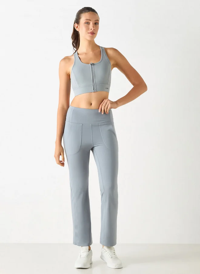 ADOT by Splash Solid Racerback Sports Bra with Cutout Detail and Zip Closure