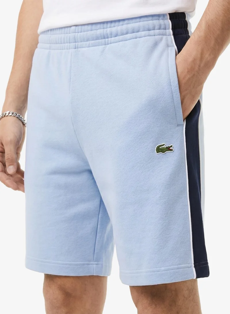 Lacoste  Regular Fit Colorblock Fleece Shorts for Men | Best Price UAE