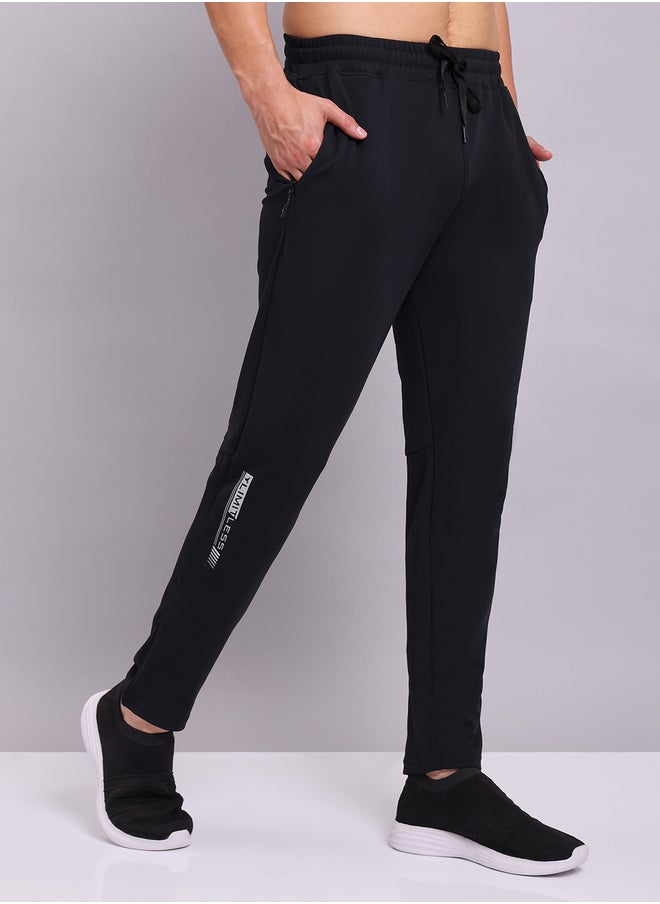 Technosport Men Black Solid 4-Way Stretch Track Pants  - Image 4