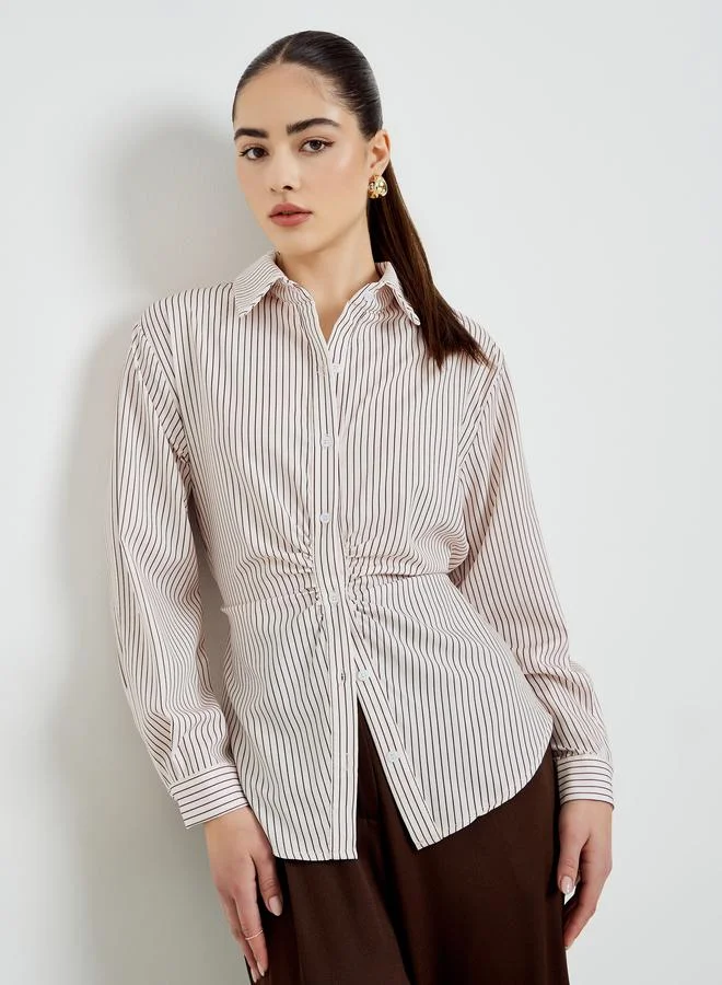 ستايلي قميص مخطط واسع بأكمام طويلة