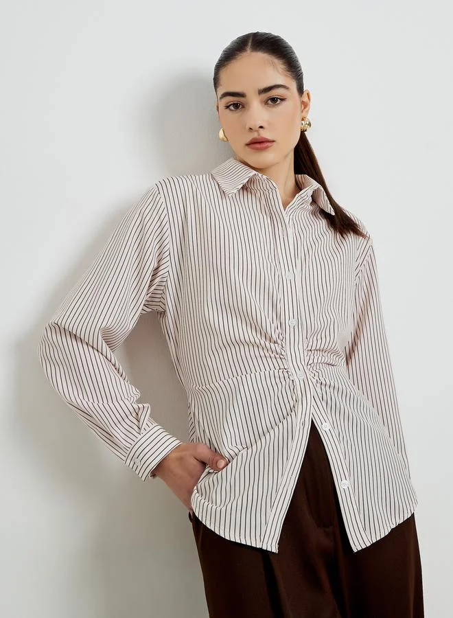 ستايلي قميص مخطط واسع بأكمام طويلة