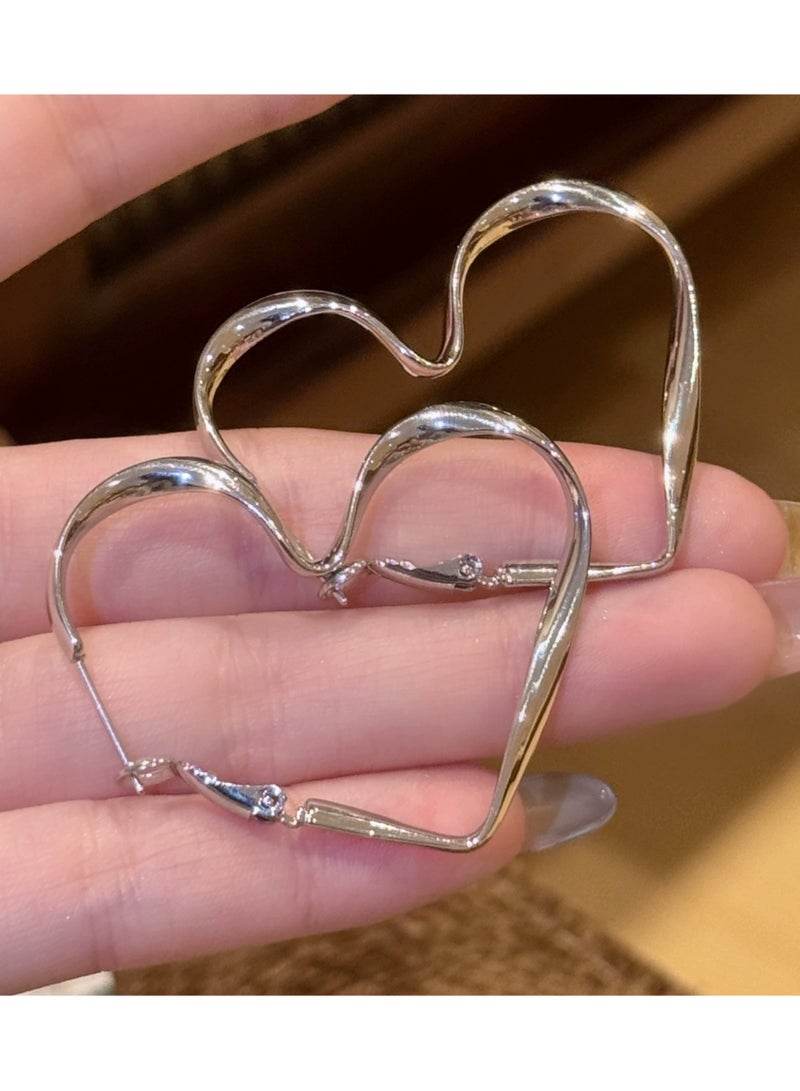 Goolsky Silver Heart Stud Earrings – Unique Minimalist Design, Elegant & Versatile Women's Jewelry  - Image 3