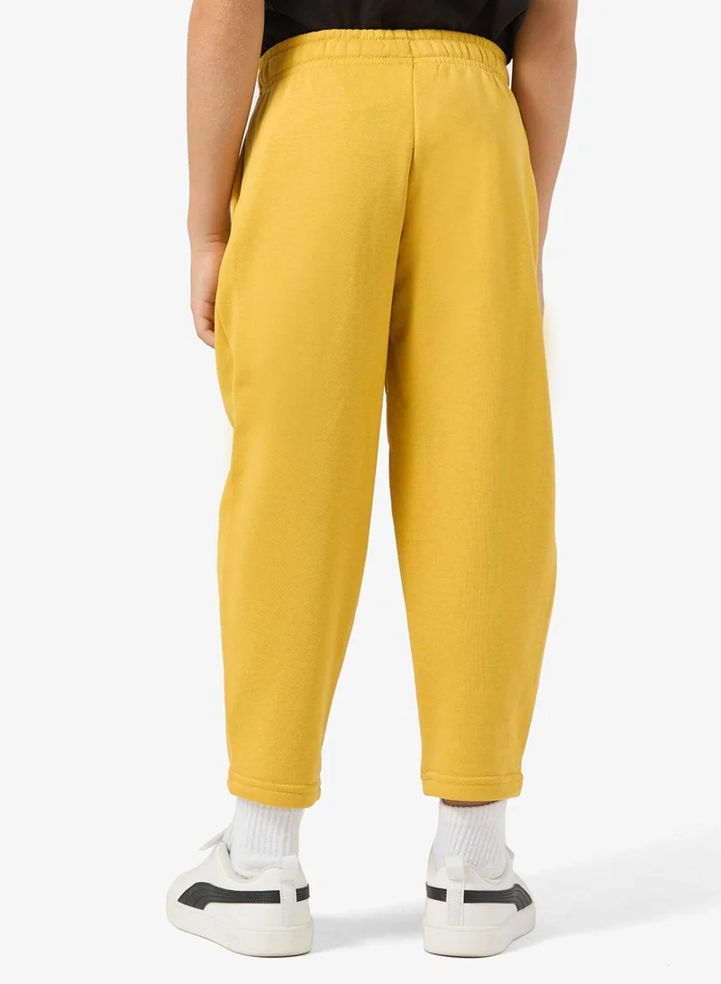 بوما بنطلون رياضي مطبوع برسومات قطة للأطفال