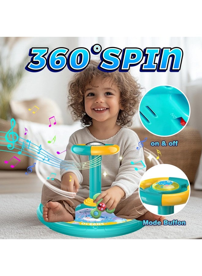 LITTCO ألعاب دوران المحيط للأطفال من 1-3 سنوات، دوران 360°، ألعاب جلوس ودوران، ضوء LED وموسيقى تعليمية، هدية مثالية لعيد الميلاد للصبي/البنت مع 3 قطع من ألعاب الدوران بمصاصة (زرقاء) - Image 2