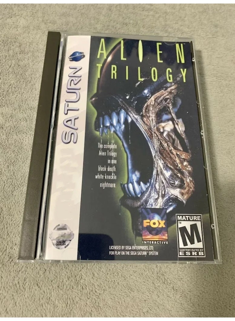 General Alien console game disc box with manual and bonus disc, retro classic optical drive direct reading adaptation.  - Image 1