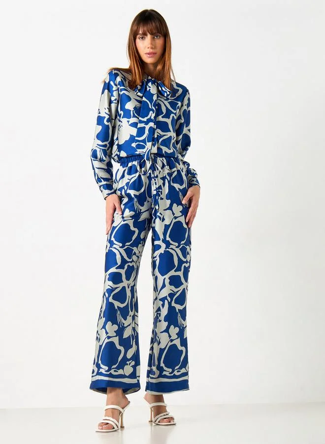 2Xtremz 2Xtremz All-Over Print Wide Leg Pants with Drawstring Closure and Pockets