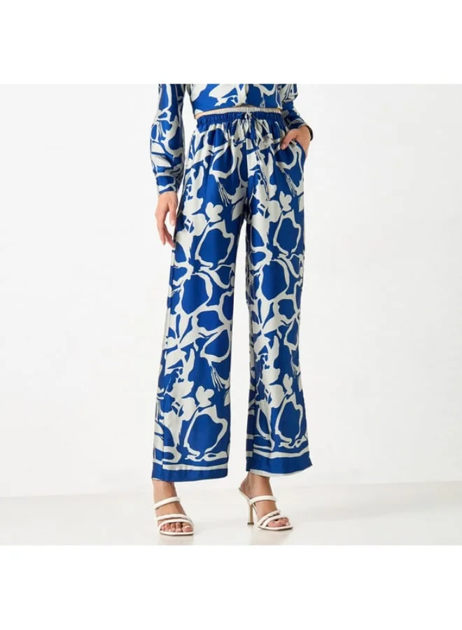 2Xtremz 2Xtremz All-Over Print Wide Leg Pants with Drawstring Closure and Pockets