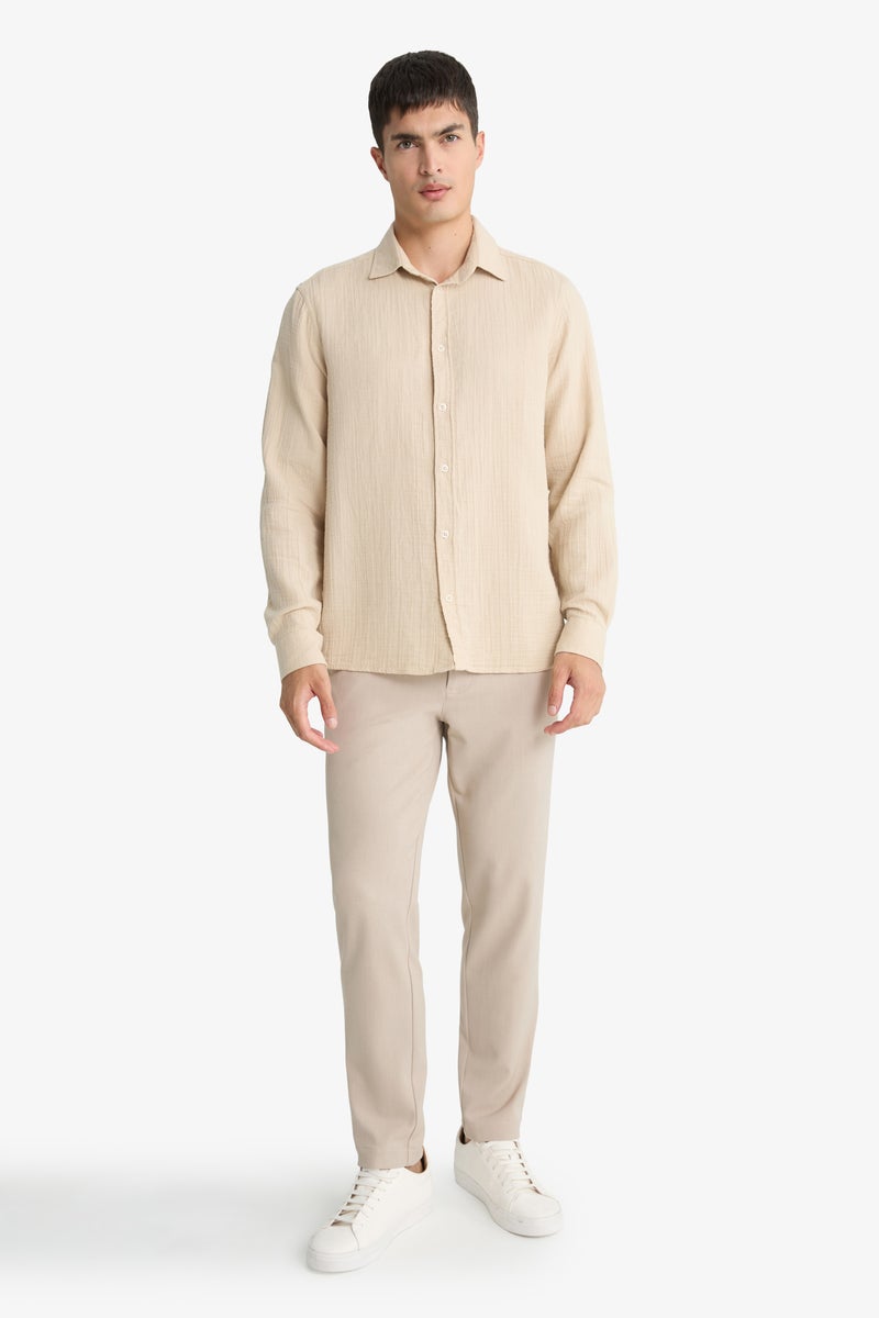 ديفاكتو قميص بولو رجالي بقصّة عادية وياقة بولو وأكمام طويلة - Image 2