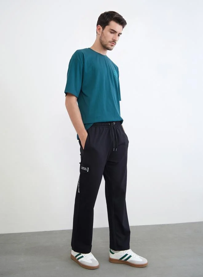 Men Applique Patch Detail Oversized Joggers