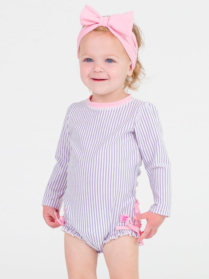 RuffleButts Baby-Girls Seersucker Long Sleeve Rash Guard - One Piece Swimsuit UPF 50+ Toddler - Image 2