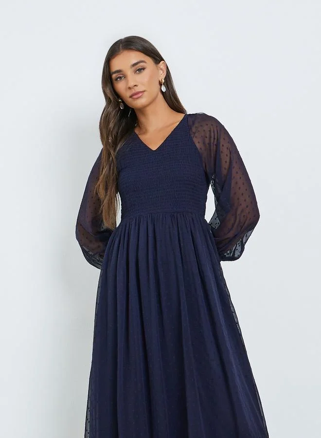 ستايلي فستان طويل بأكمام دوبي شفافة